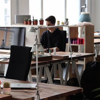 A Man is Working in Office