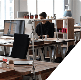 A Man is Working in Office Image